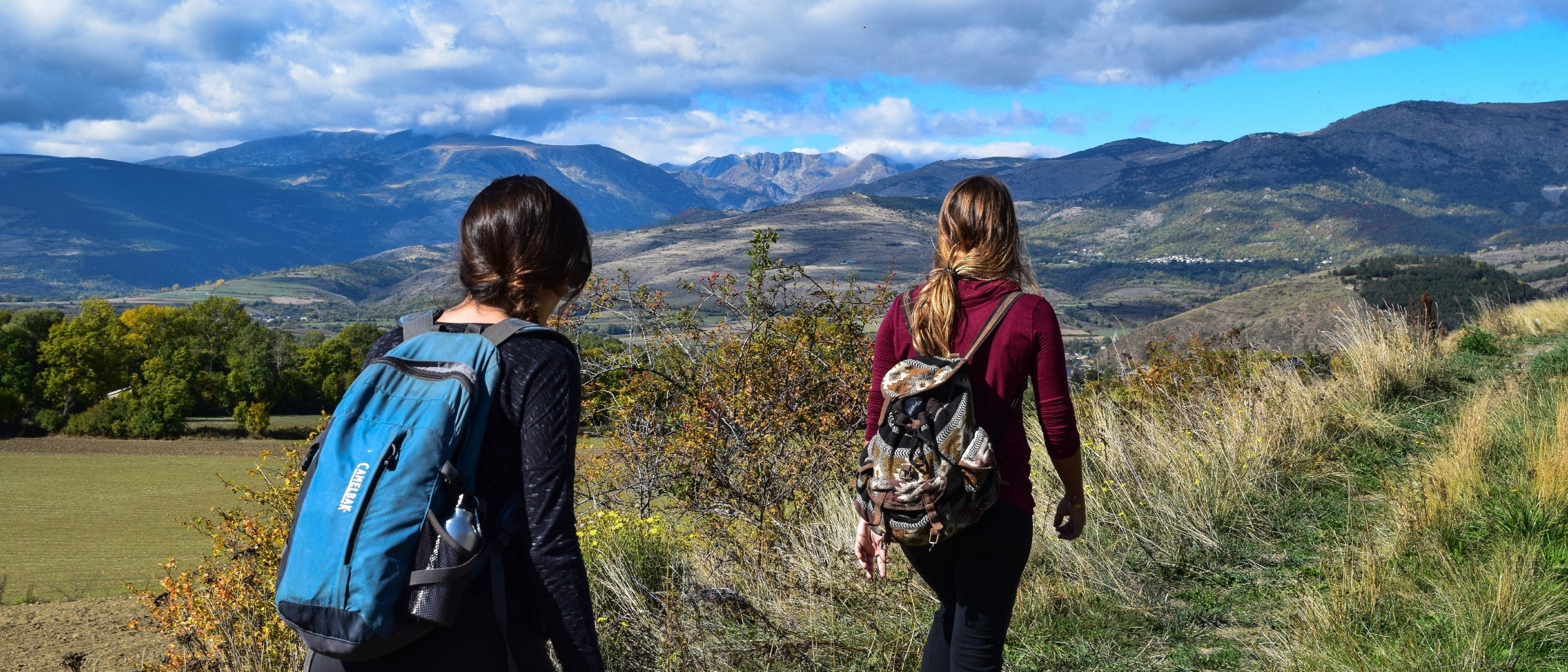 Women Walking in the Mountains