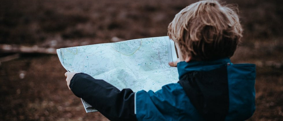 Boy map reading