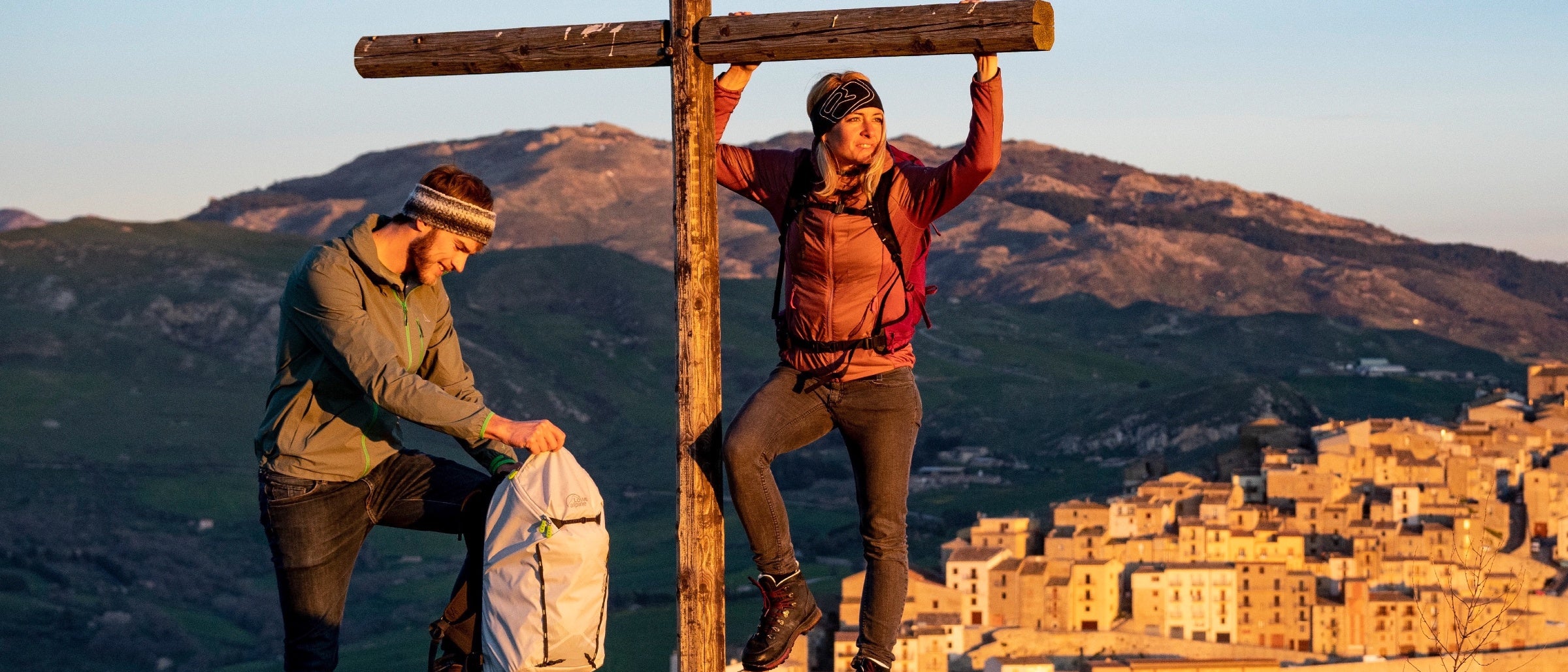 Man and Women Stood Ontop of Hill