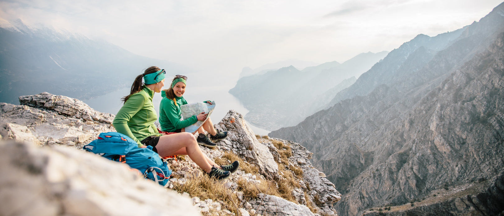 Women Sat on Mountain Mapreading